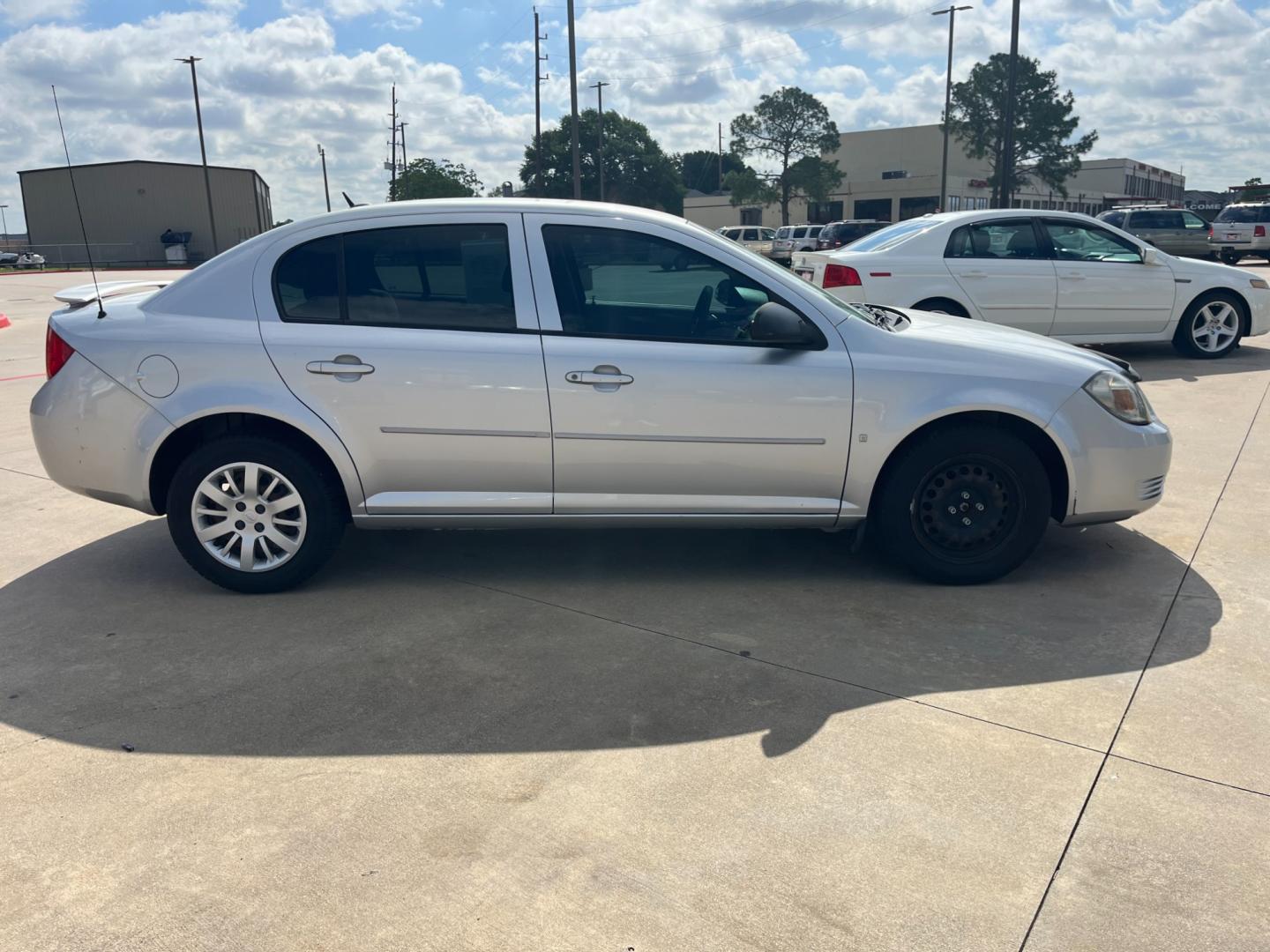 2009 SILVER /black Chevrolet Cobalt LS Sedan (1G1AS58H697) with an 2.2L L4 DOHC 16V engine, 4-Speed Automatic Overdrive transmission, located at 14700 Tomball Parkway 249, Houston, TX, 77086, (281) 444-2200, 29.928619, -95.504074 - Photo#7